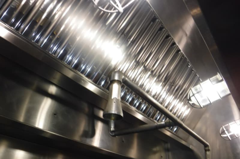 Kitchen exhaust hood filters gleaming after a cleaning in Orange County