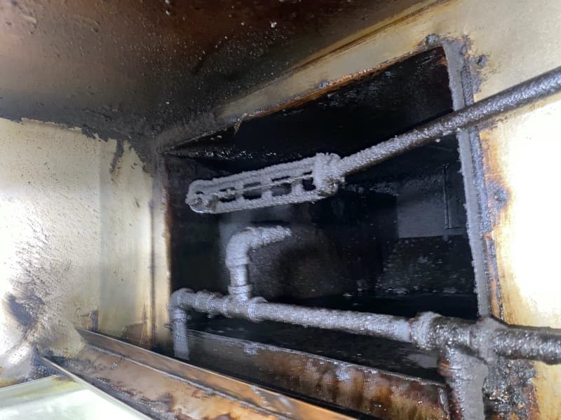 Grease-coated exhaust plenum before hood cleaning in Silver Lake