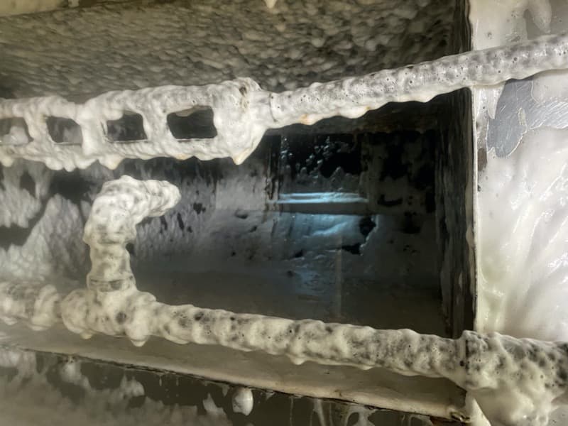 Foaming degreaser working on a kitchen exhaust system in Silver Lake, Los Angeles