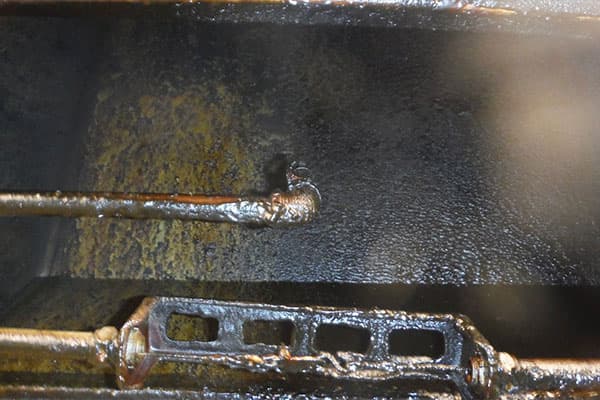 Grease coating the inside of a kitchen exhaust plenum on a Los Angeles job